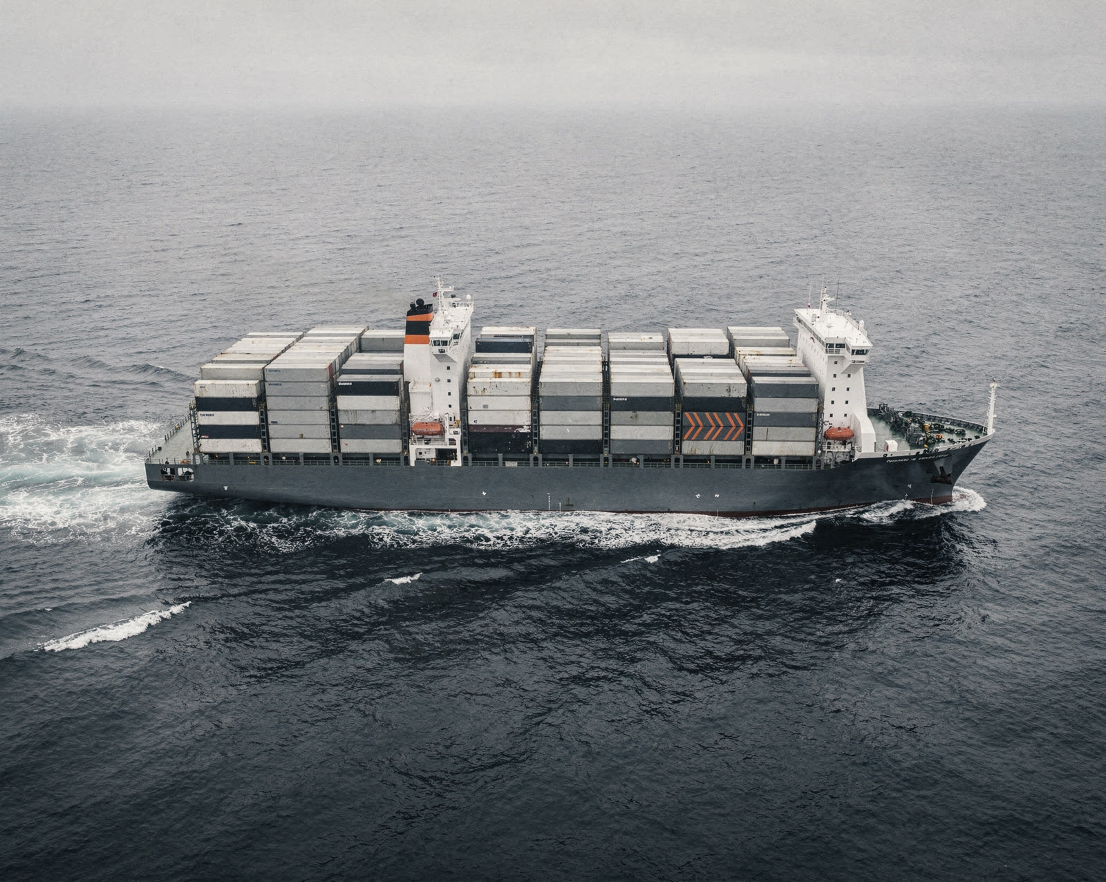A loaded container ship under way on the open sea